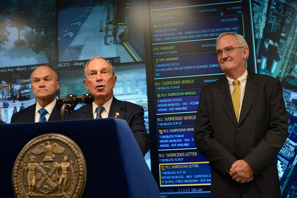 New York City Mayor Michael Bloomberg speaks during a news conference in New York, joined by New York City Police Commissioner Raymond Kelly (left) and Microsoft Vice President of Americas Services Mike McDuffie (right).