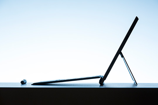 The stunningly thin and beautifully designed Surface Pro 3 with the Surface Pro Type Cover attached. To the left is the custom Surface Pen, crafted with a solid, polished aluminum finish, and designed to look and feel like an actual fountain pen to give you a natural writing experience. 