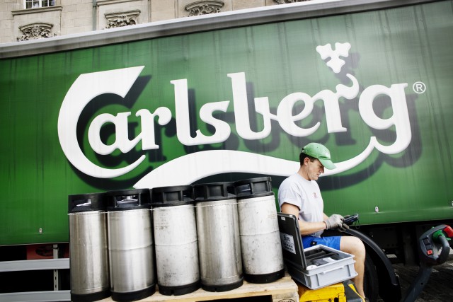 A Feldschlosschen driver in front of a truck on his way to deliver beer to local restaurants in Zurich.