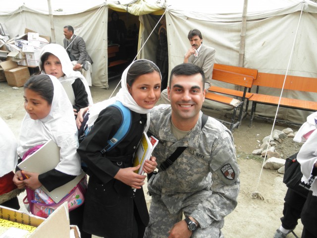 Tyler-deployed-with-local-Kabul-girl-640x480