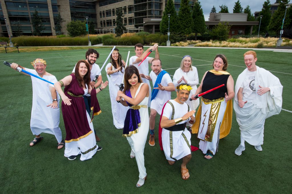 Dona Sarkar and her team photographed on the soccer field at The Commons on Microsoft's campus in Redmond, Wash. on August 8, 2016. The team includes (from left) Joe Camp, Cheryl Sanders, Blair Glennon, Tyler Ahn, Dona Sarkar, Derek Haynes, Thomas Trembly, Manik Rane (kneeling), Ursula Hildenbrand, Joan Steelquist and Seth Rubinstein. Photo by Dan DeLong