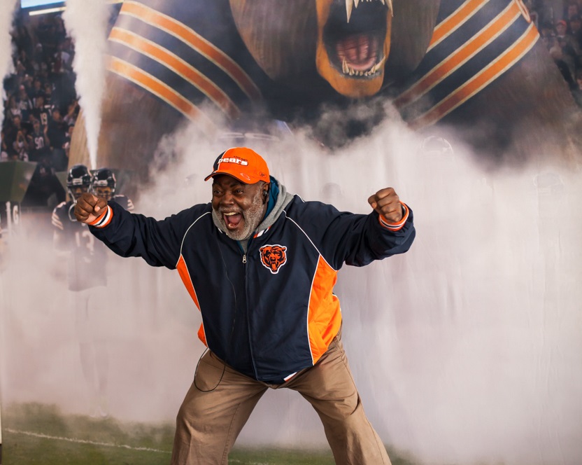A Chicago Bears fan shows his passion at the FoxTales kiosk.