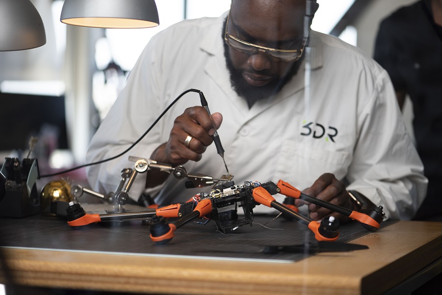 Man working on autonomous device