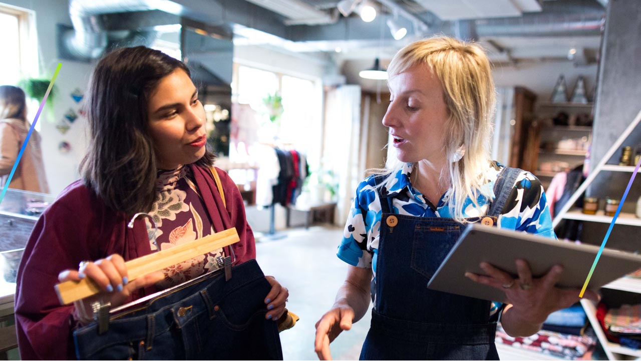 Two women in a retail store