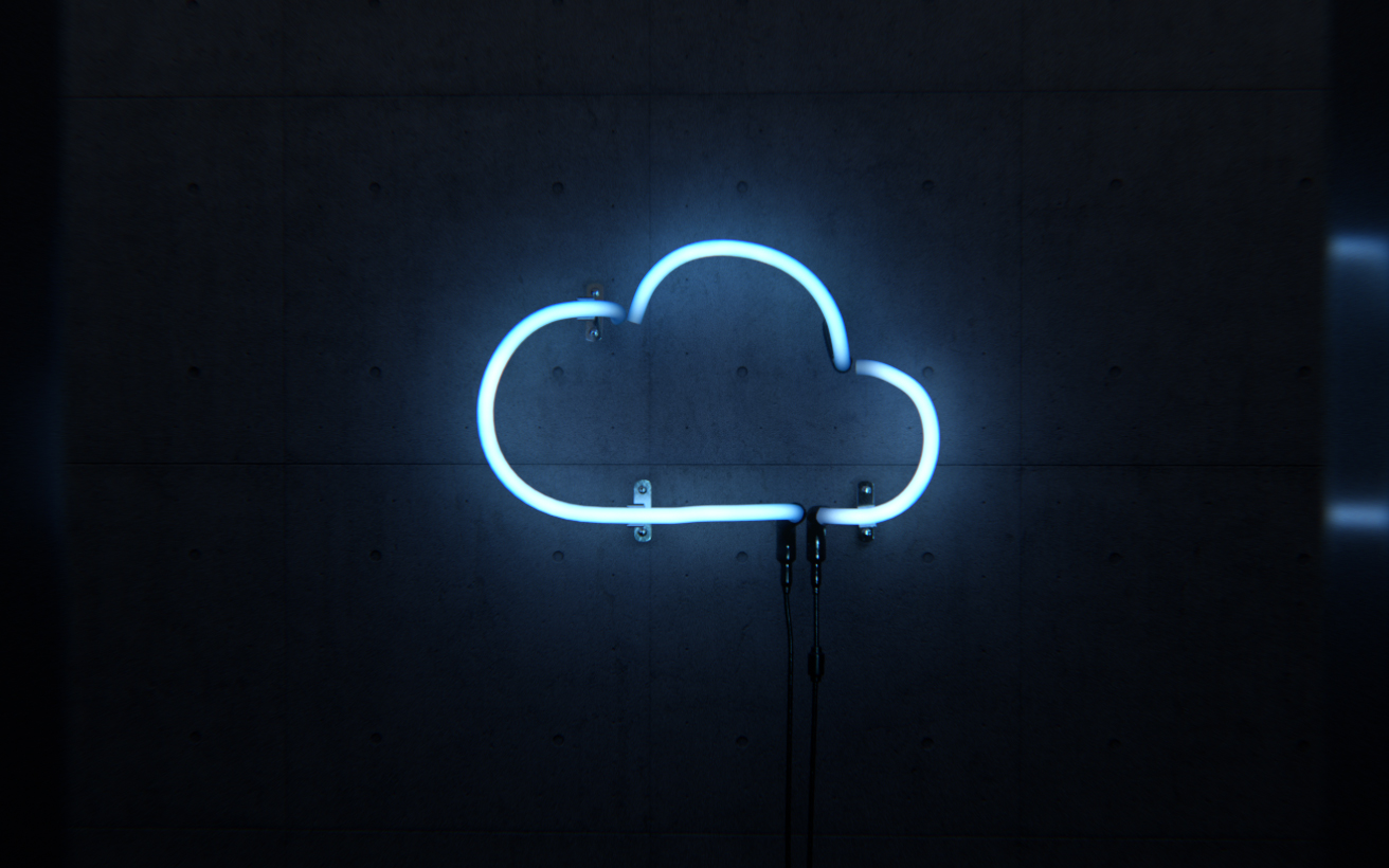 A neon sign in the shape of a cloud