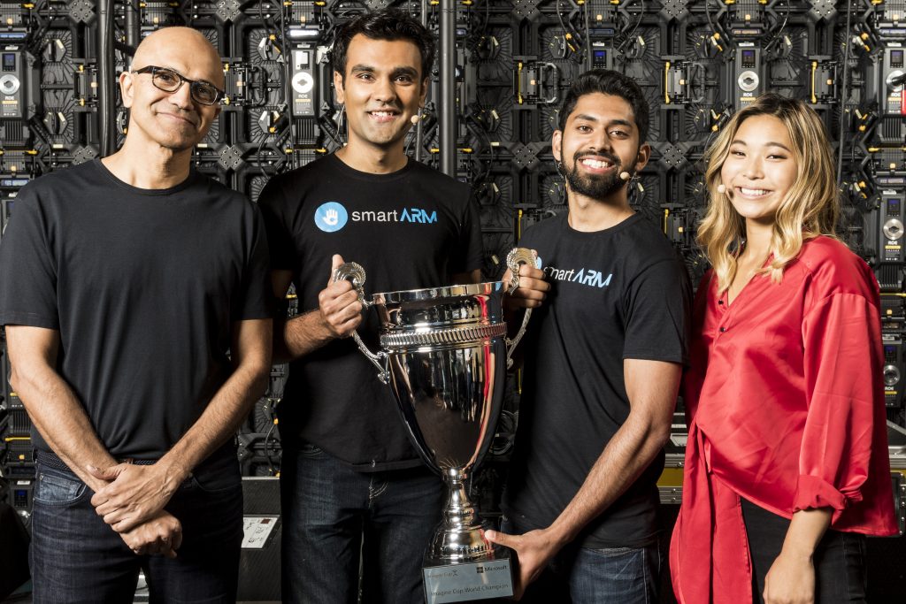 Satya Nadella with the smartARM team, 2018 Imagine Cup winners, and Chloe Kim, special guest and Olympic snowboarding gold medalist.