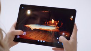 Photo of a tablet in someone's hands