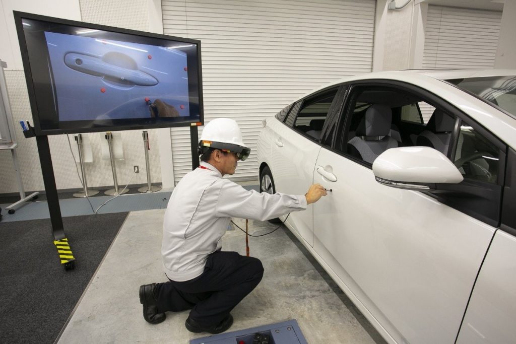 A Toyota engineer uses Microsoft HoloLens to perform a process called “film coating thickness inspection” to manage the thickness of the paint for consistent coating quality on every vehicle.