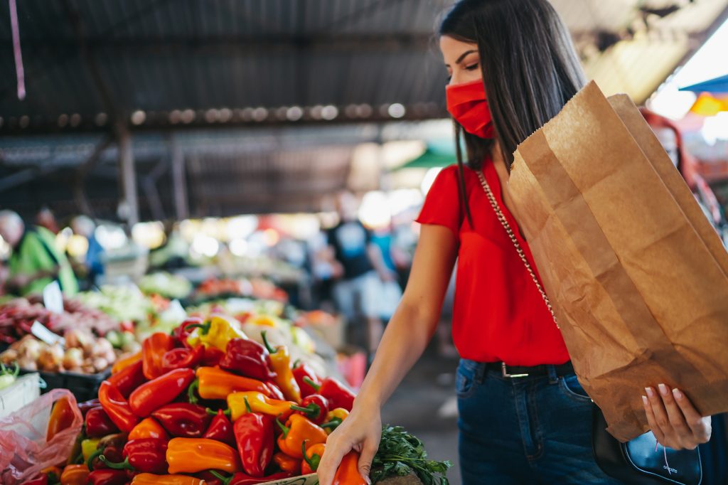 Woman shopping for produce in a market