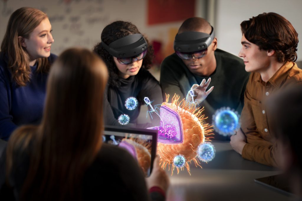 Three students using HoloLens
