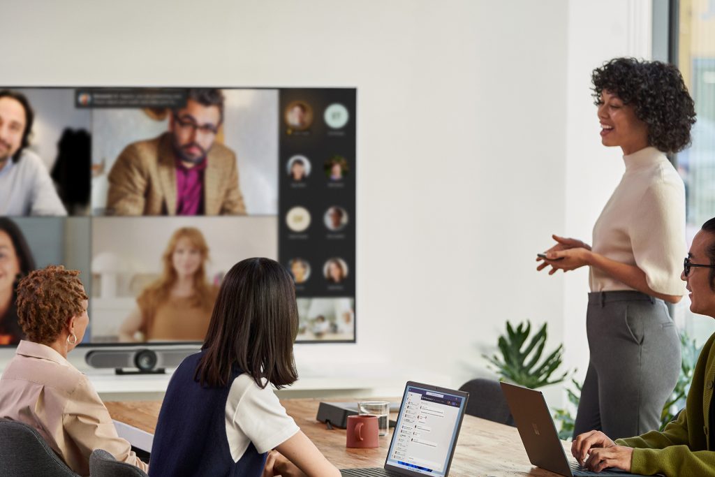Employees at a Microsoft Teams meeting