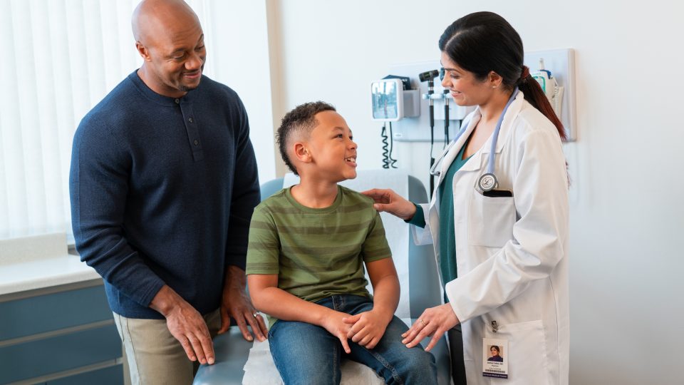 Doctor seeing young patient