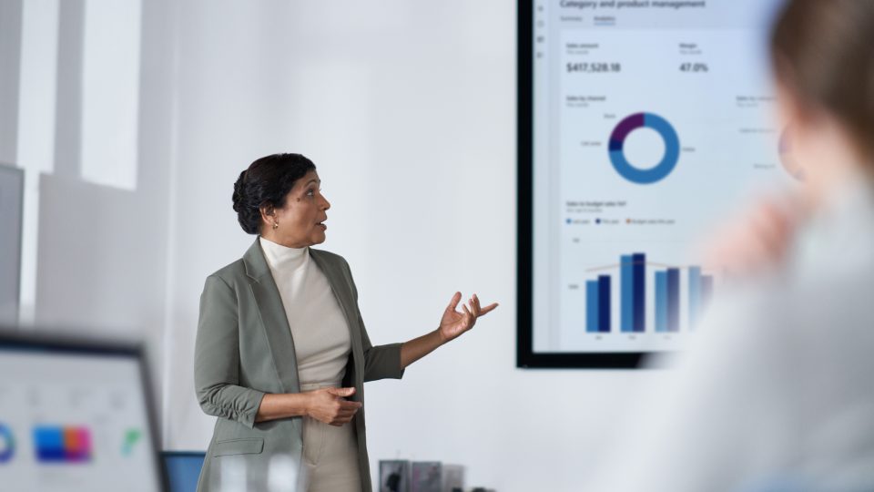 Woman giving office presentation