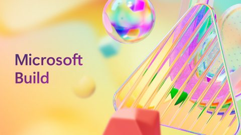 Microsoft Build header with colorful balls on a yellow background