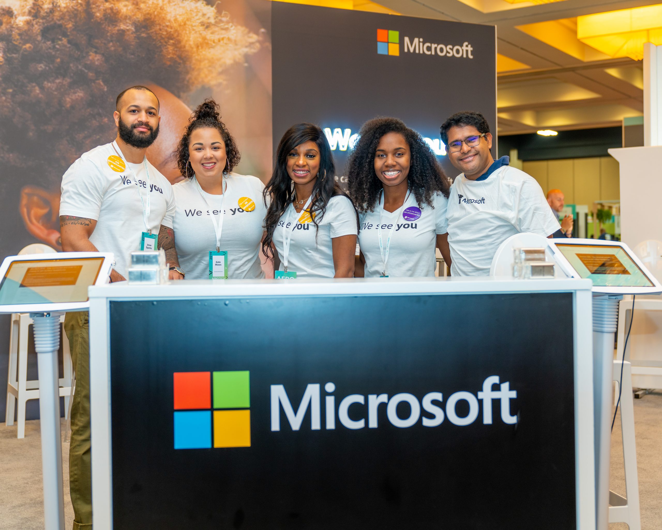 Booth at AfroTech with Microsoft recruiters