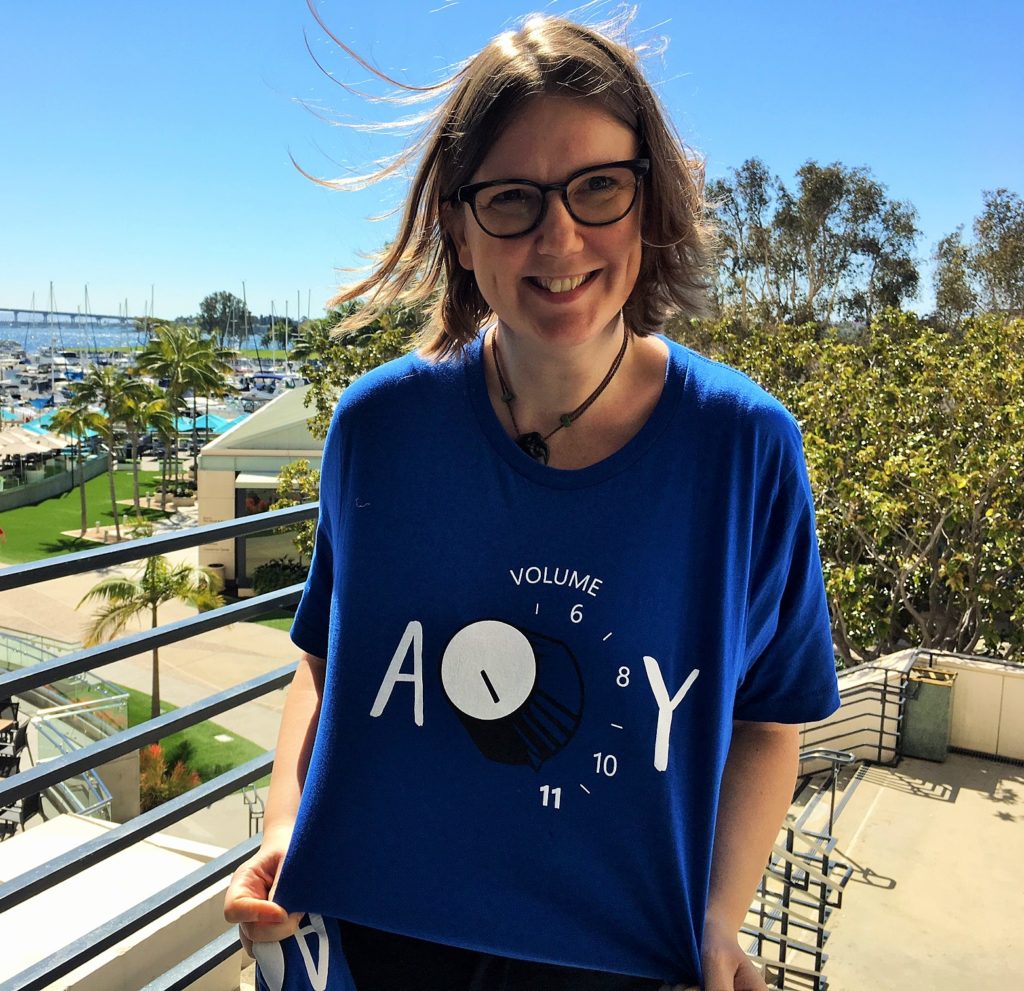 Jenny Lay-Flurrie wearing blue Microsoft accessibility t shirt