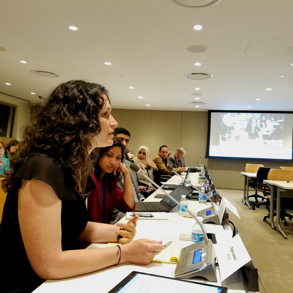 Megan Lawrence (left) speaks on panel at UN in New York.