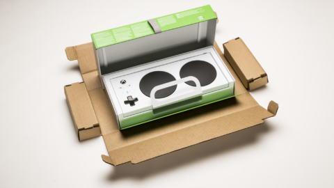 The Xbox Adaptive Controller in an opened box.