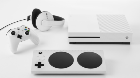 The Xbox Adaptive Controller with the Xbox, Xbox headphones and an Xbox controller.