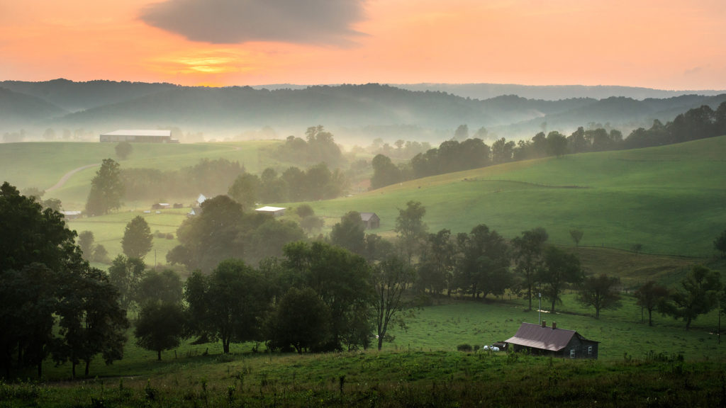 A sunset over a rural Virginia countryside