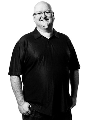 Black and white image of Kevin Scott on a white background
