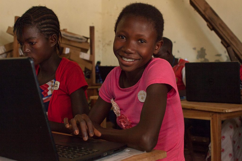 Girl at computer in Democratic Republic of Congo