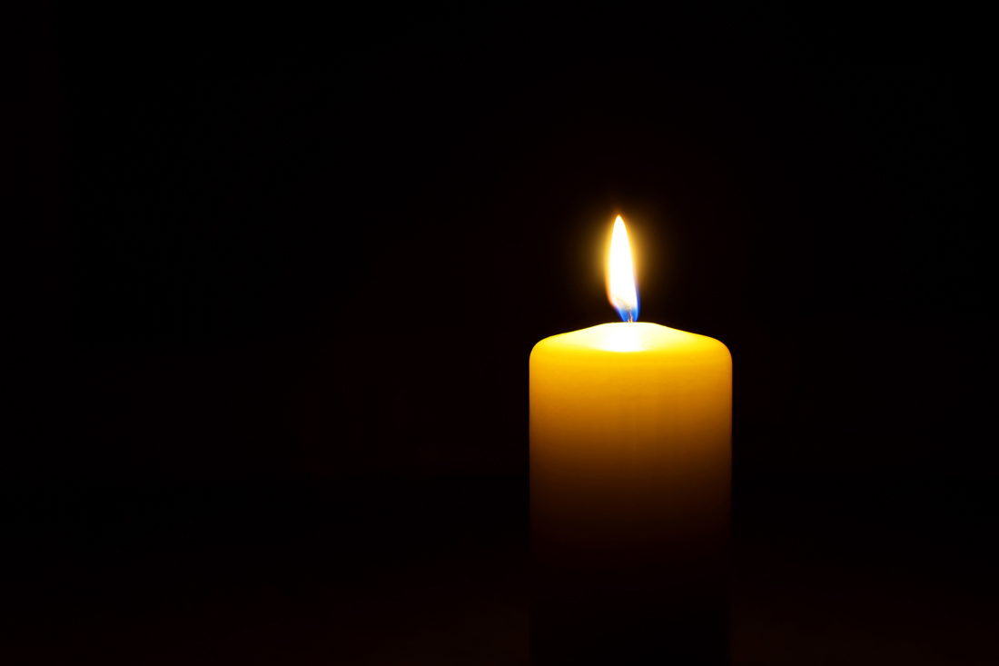 A candle in darkness