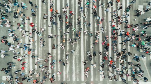 an abstract image of a crowd viewed from above
