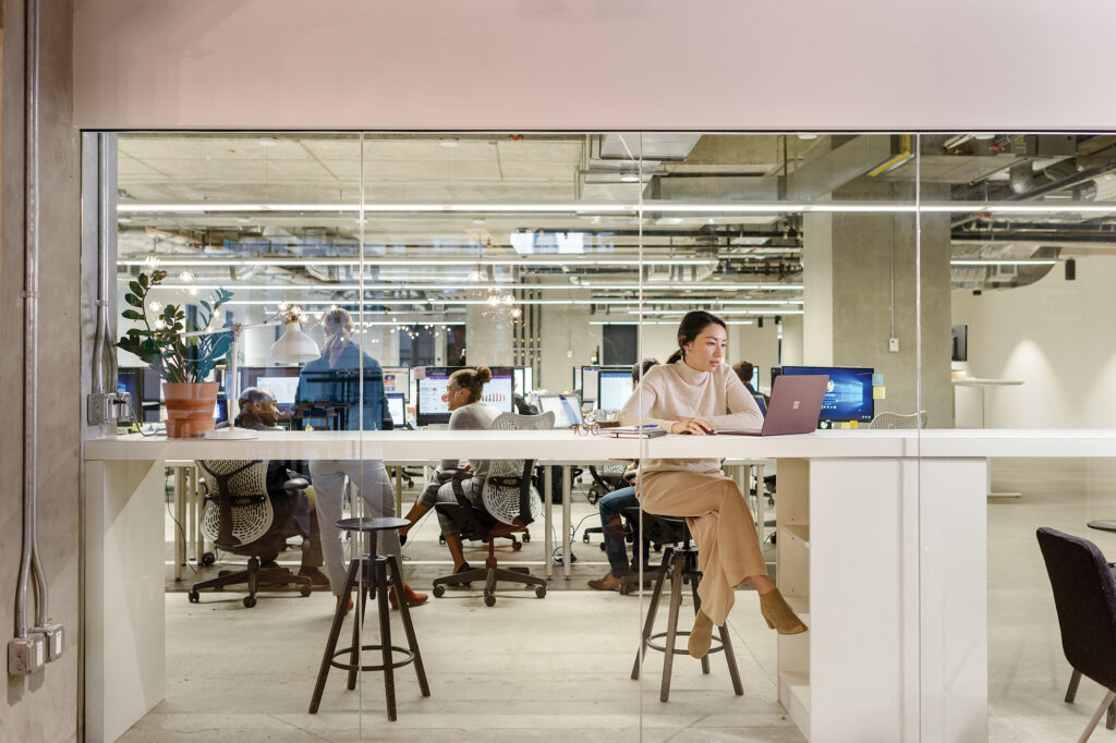 A woman at a desk in an office.