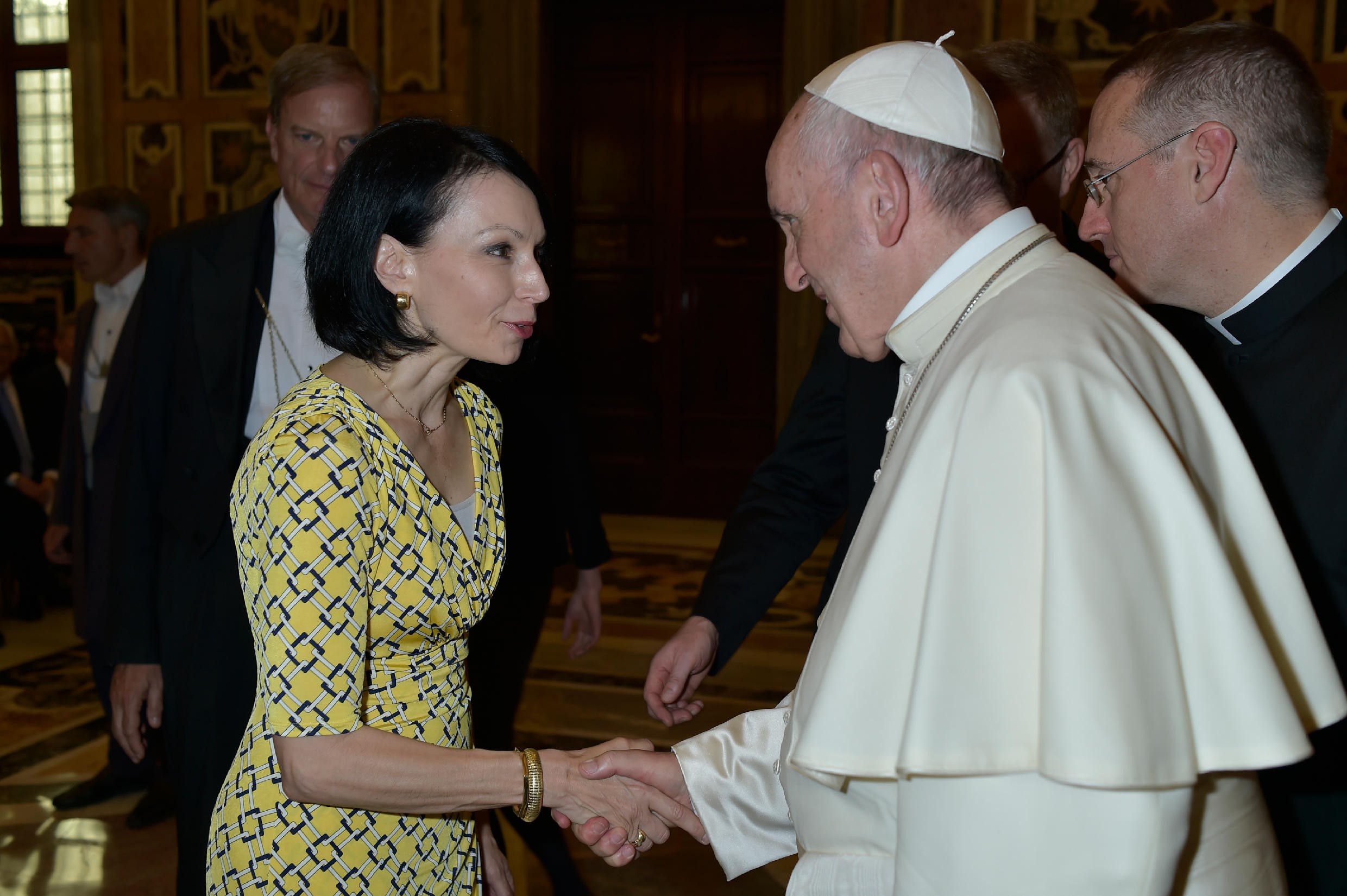 Jacqueline Beauchere of Microsoft shakes the hand of Pope Francis at the first World Congress: Child Dignity